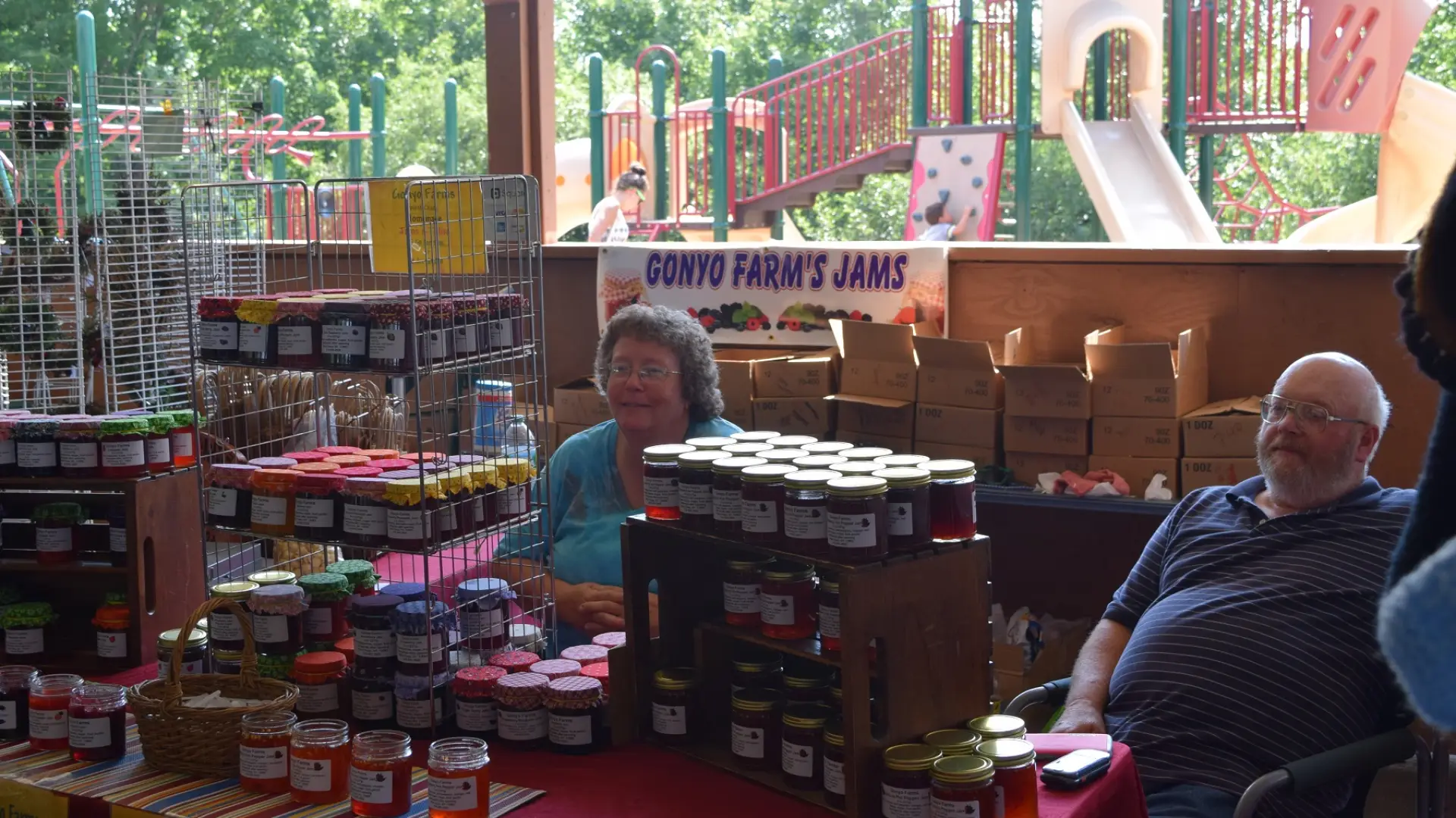 Vendors selling home made preserves in the pavillion