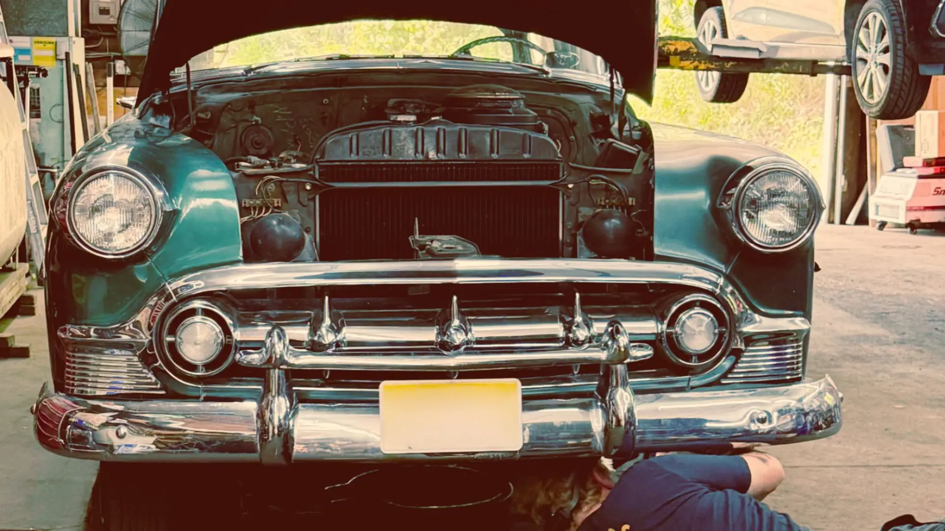 old car getting worked on