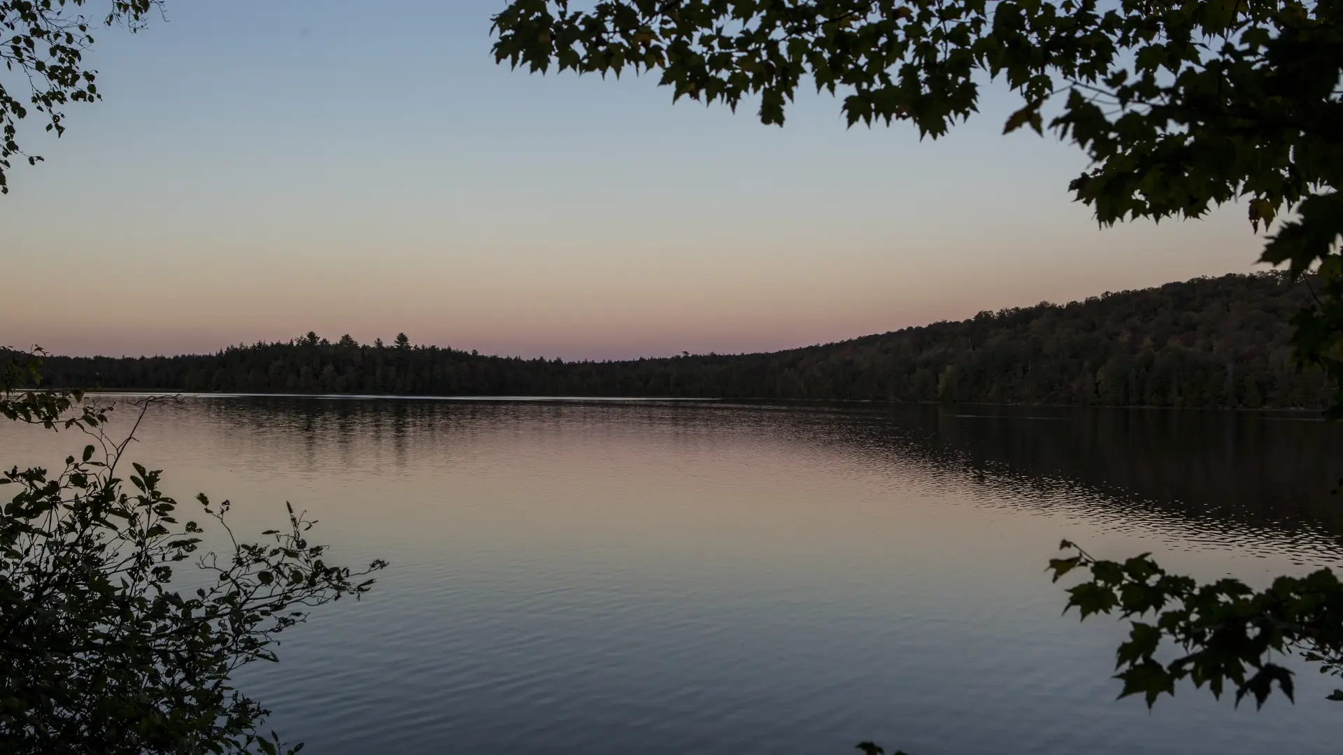 Photo of the sun setting over Eighth Lake