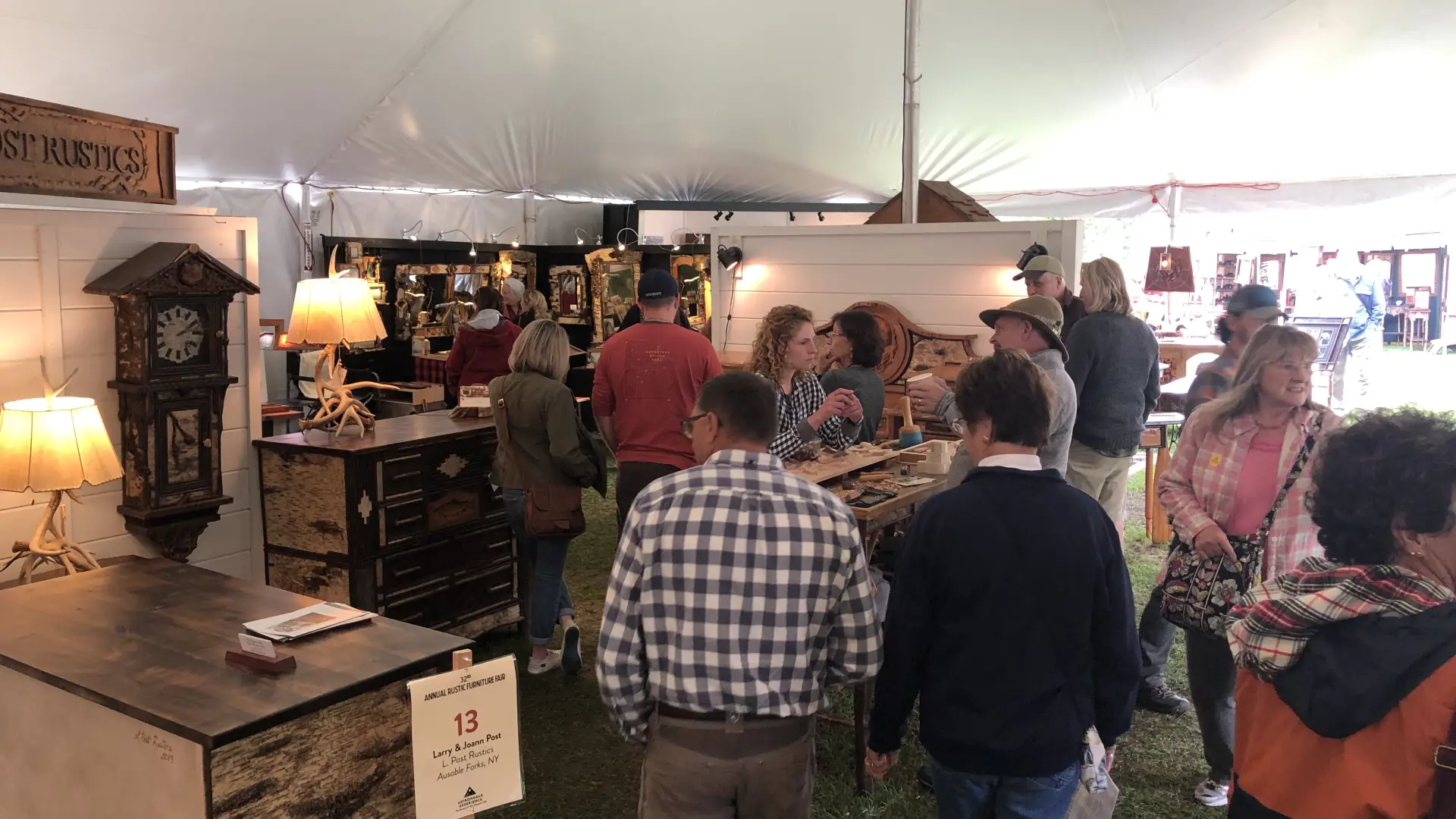 a crowd at the ADX Rustic Fair