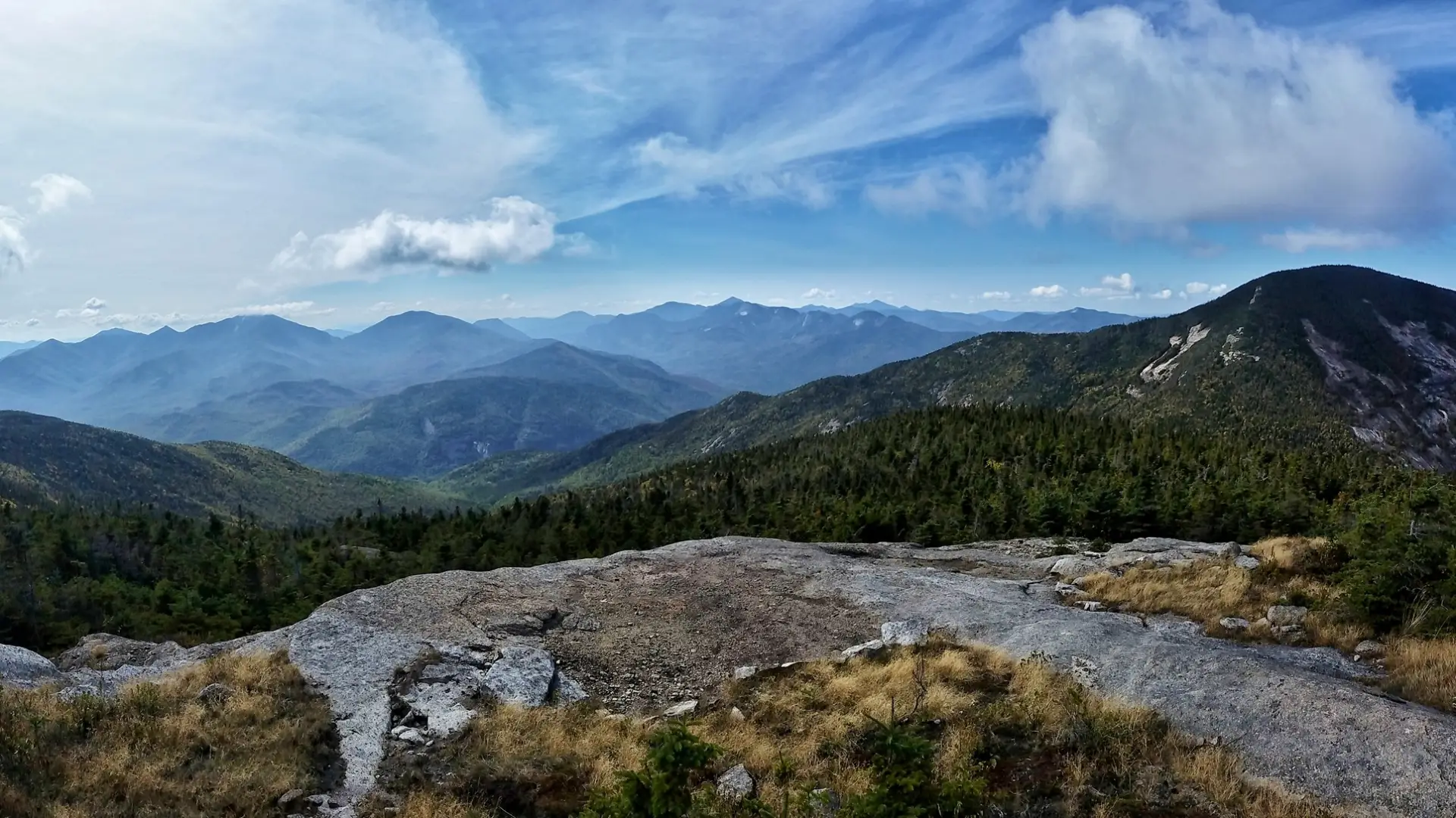 The view from a tall, rocky mountain