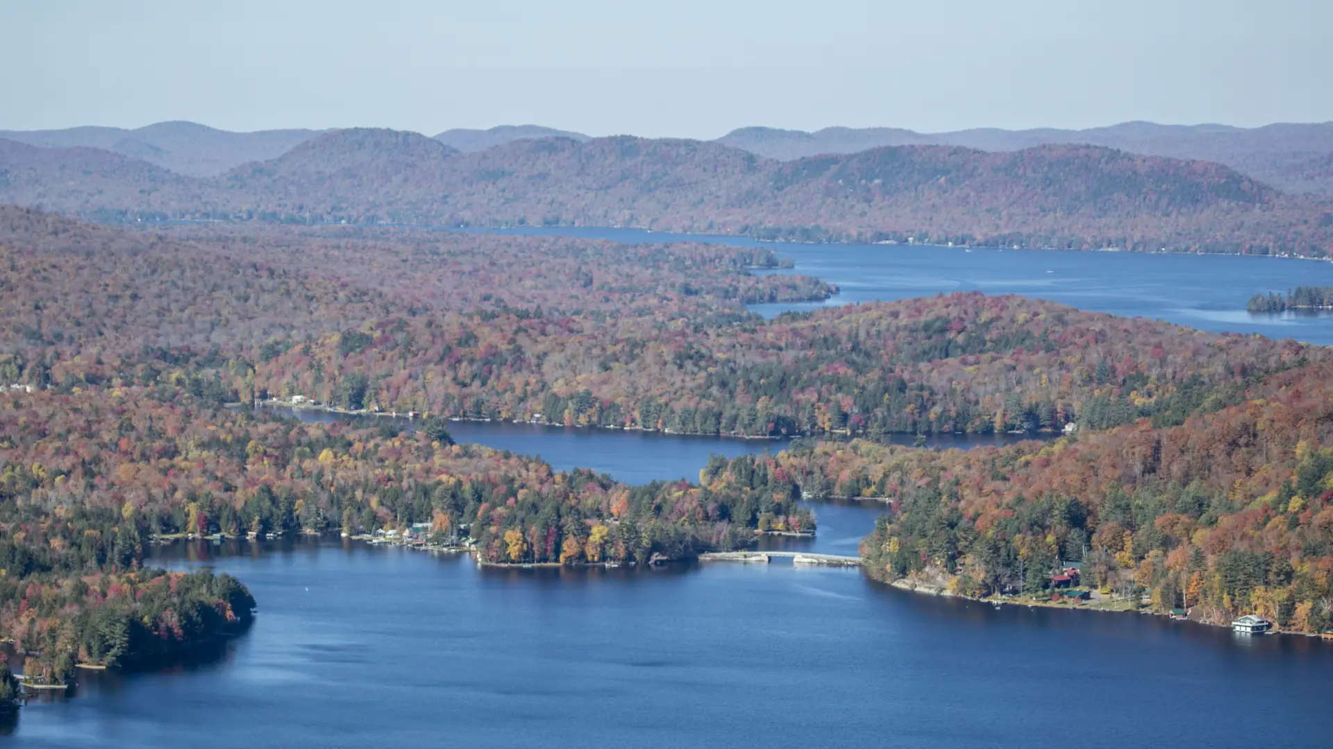 Aerial view of Eighth Lake and the surrounding area during the peak of fall foliage