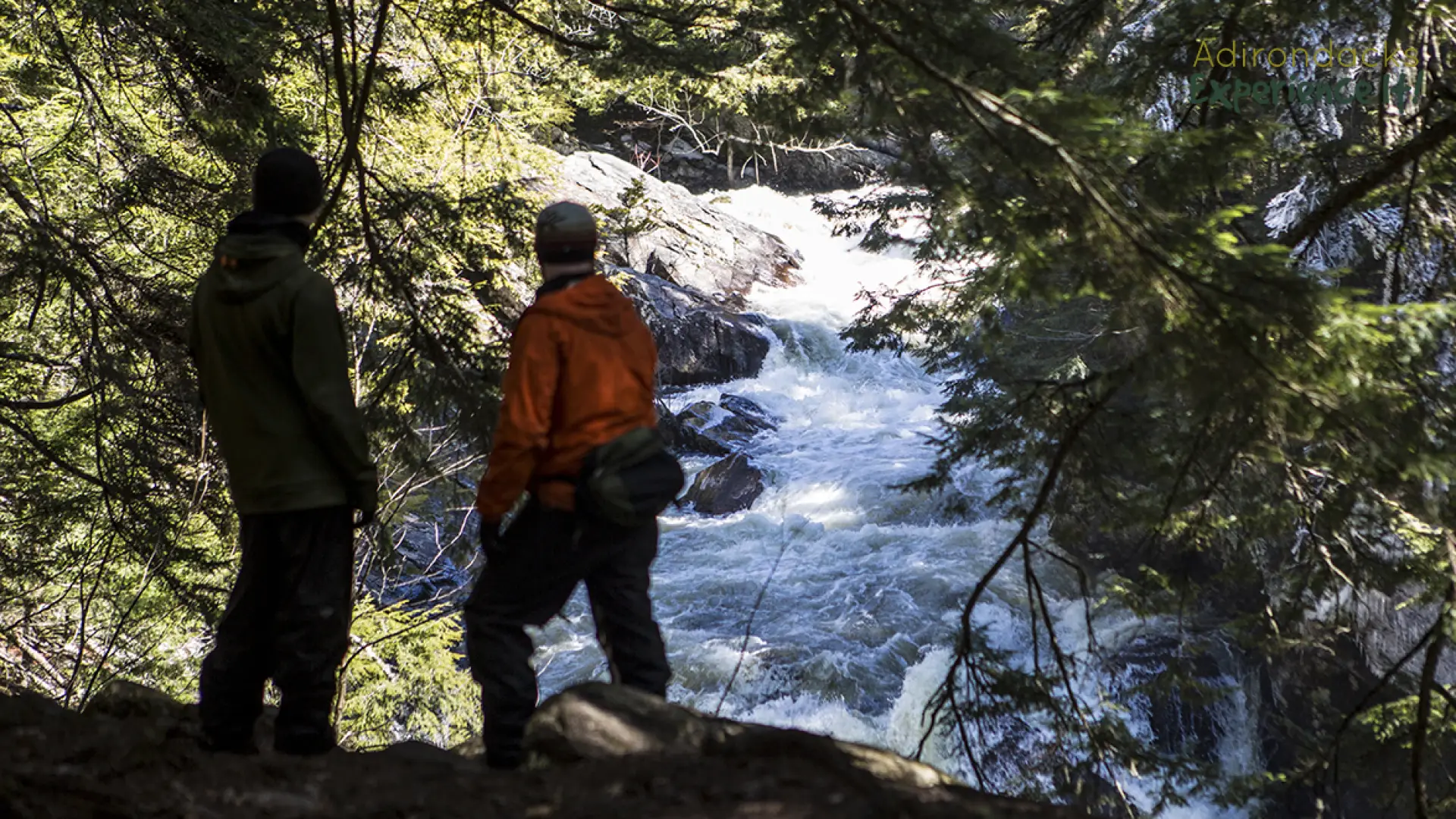 A couple looks out at Auger Flats Falls