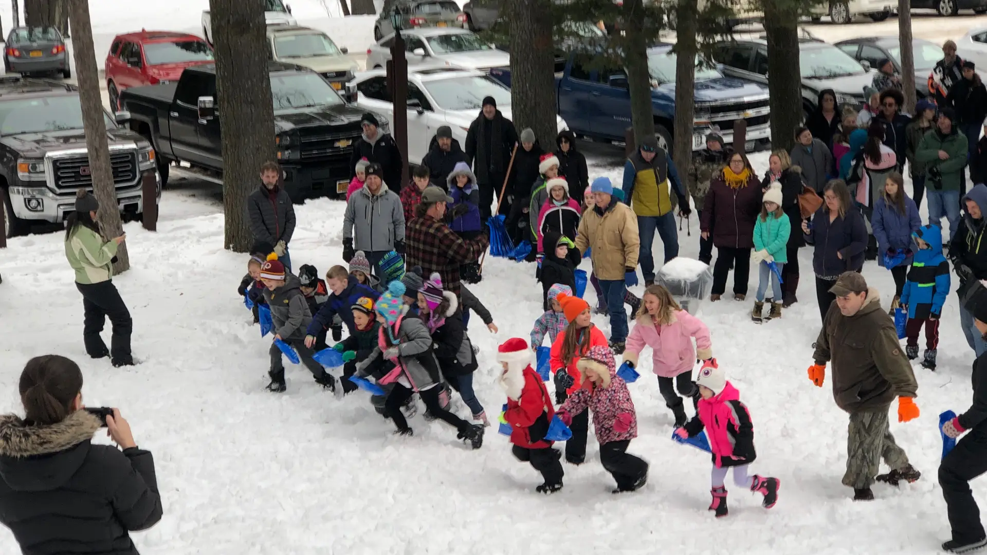 children in winter searching for candy canes