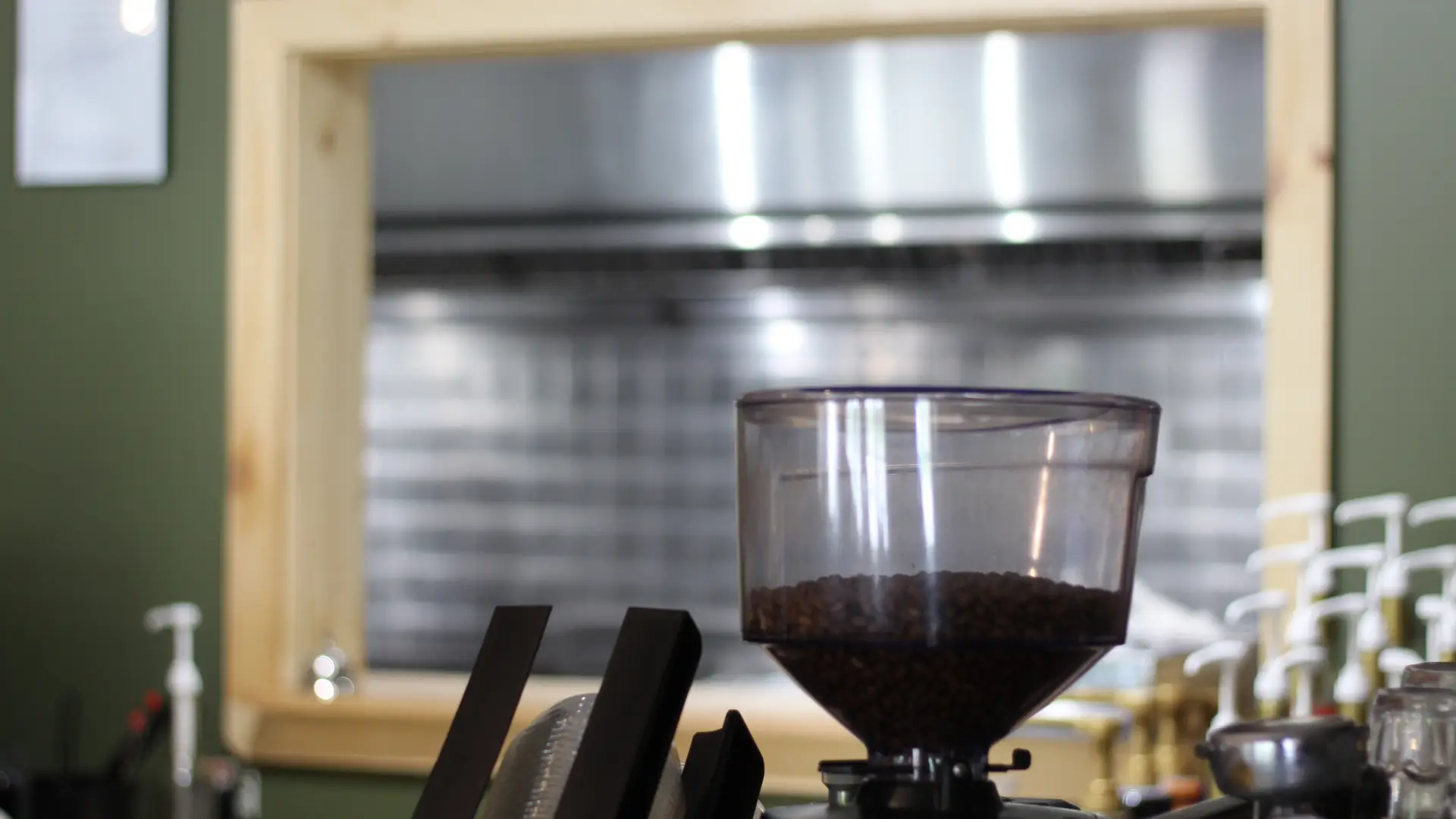 The coffee grinder with an array of flavorings for the specialty coffees.