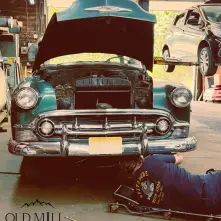 old car getting worked on