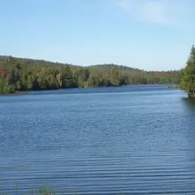 Lake Abanakee is long and shallow, with great scenery.