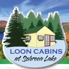 An illustration of a yellow cabin surrounded with pine trees with Loon Cabins at Schroon Lake.