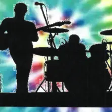 A silhouette of a person playing guitar and drums in front of a rainbow tie dye background