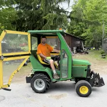 Justin on tractor
