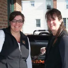 Ladies putting on a BBQ for the bank