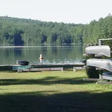 canoe rack in front of lincoln pond