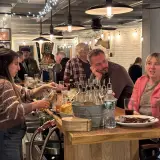 bartender making drinks behind the bar