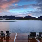 Sunset view of the high peaks from Elk Lake Lodge docks
