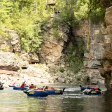 Float down the river in style with Ausable Chasm custom rafts
