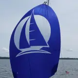 Blue sail on sailboat