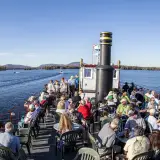 view from the top deck of the boat on a sunny day.