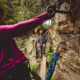 Experience the chasm from above harnessed to cables and walking wooden planks