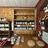 Sauces and pies line the shelfs of the shop