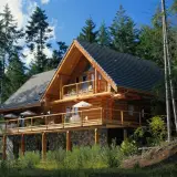The exterior of a three story log cabin with wrap around deck and balcony above