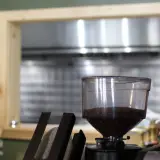 The coffee grinder with an array of flavorings for the specialty coffees.
