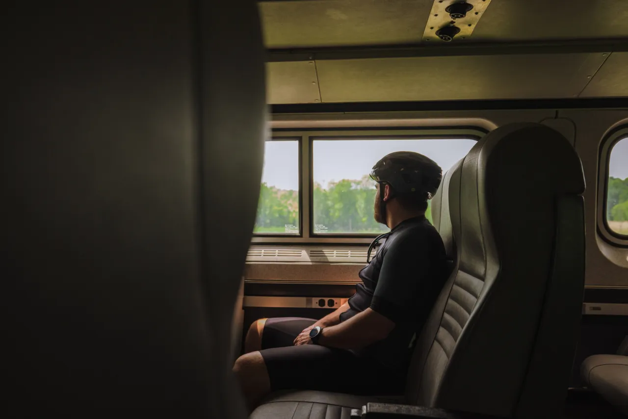 A cyclist riding the Amtrak.