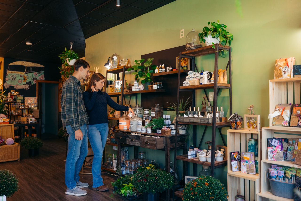 shoppers looking at selection on shelf