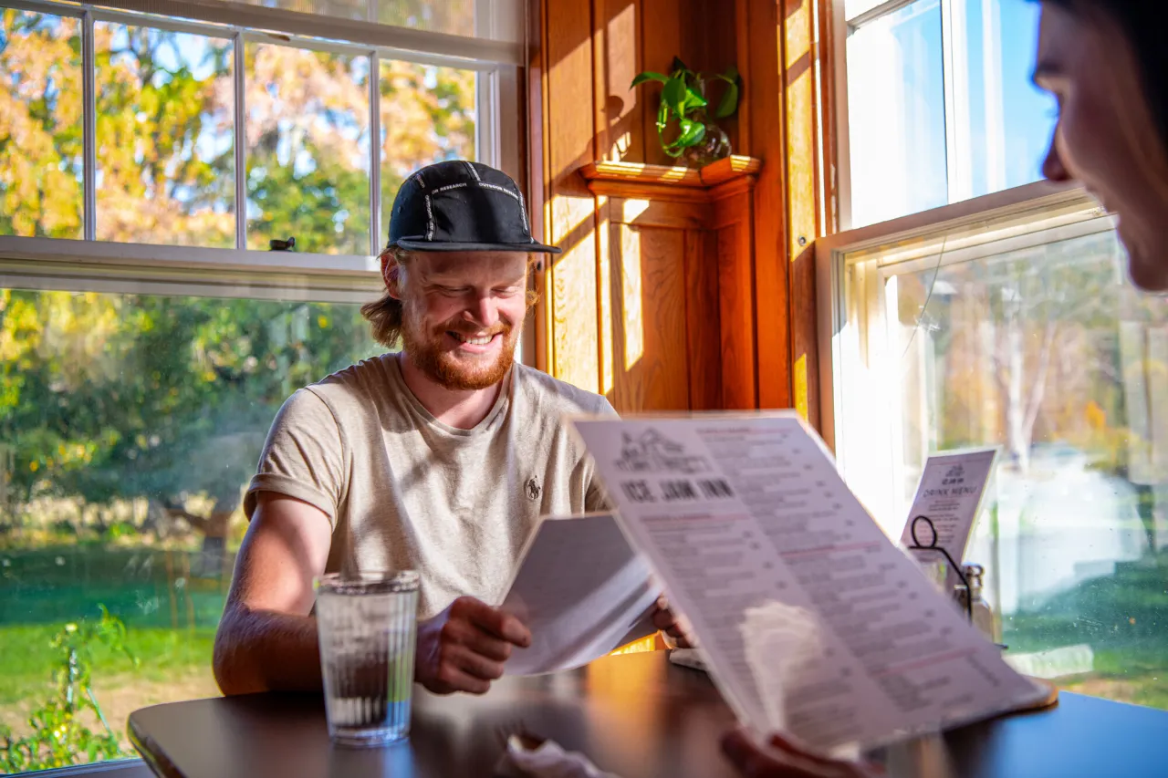 A couple dining in the Whiteface Region.