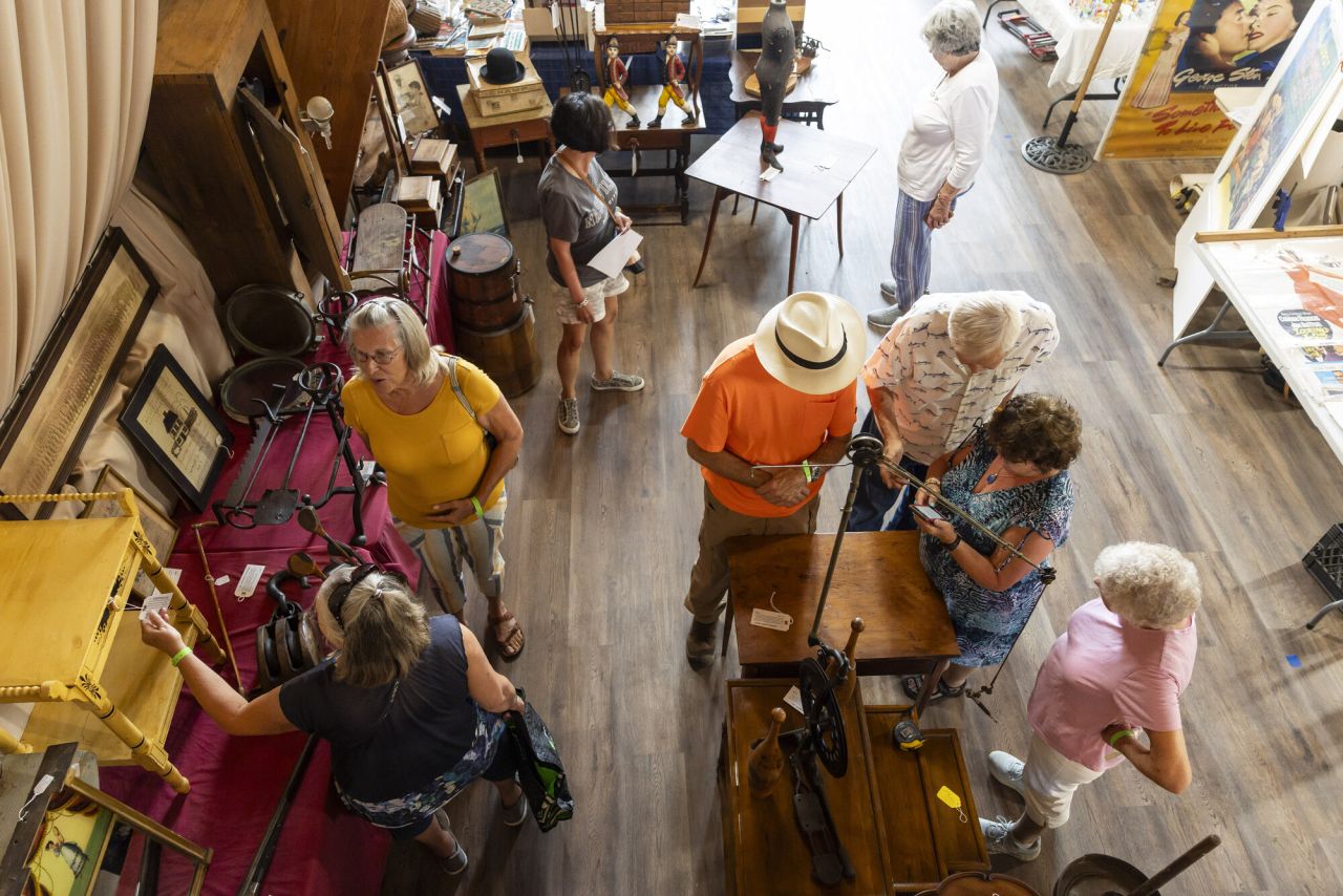 People shopping at a Hub antique show.