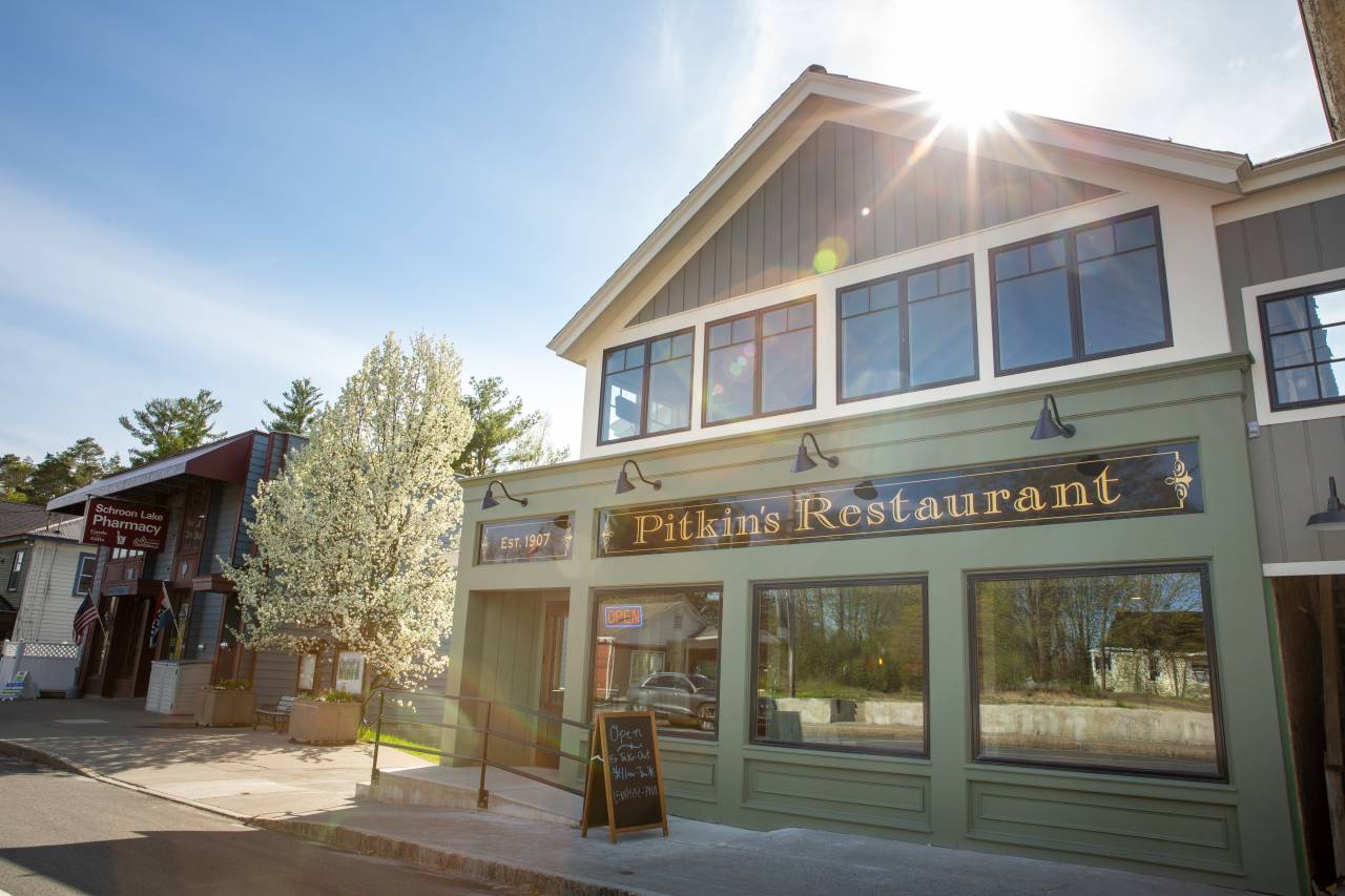 A mint green restaurant and pub. 