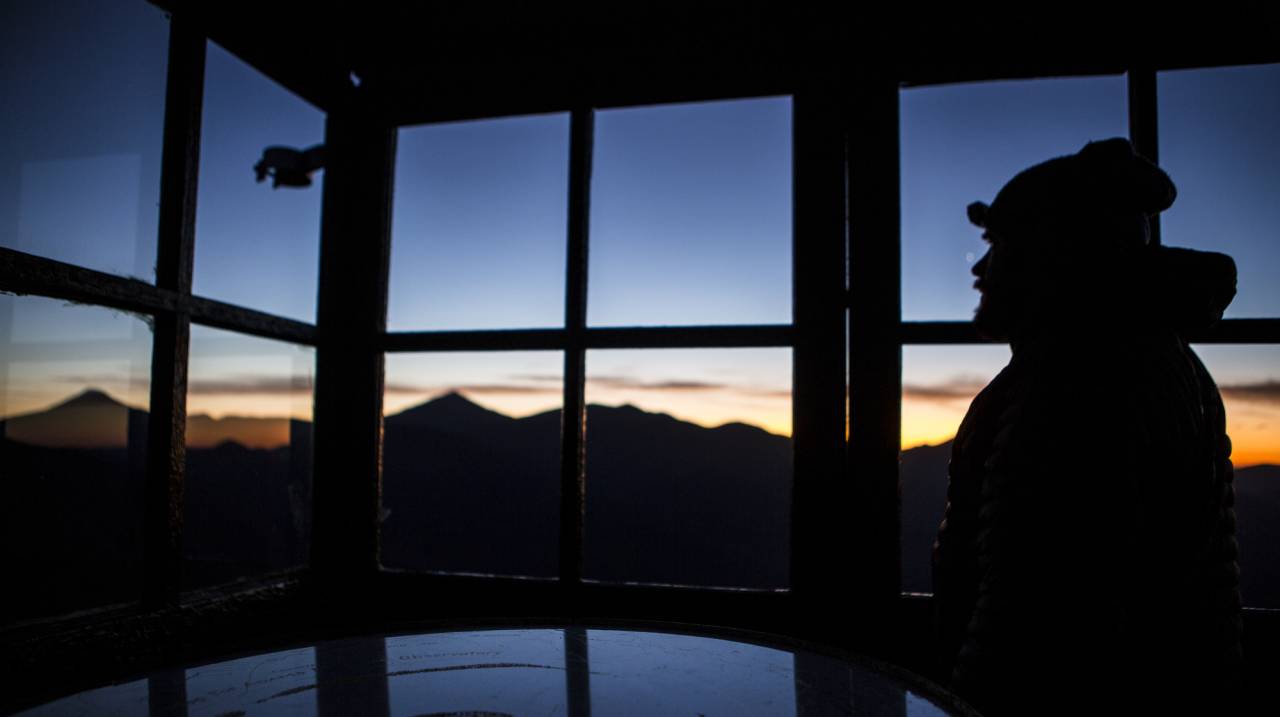 A firetower at dawn. 
