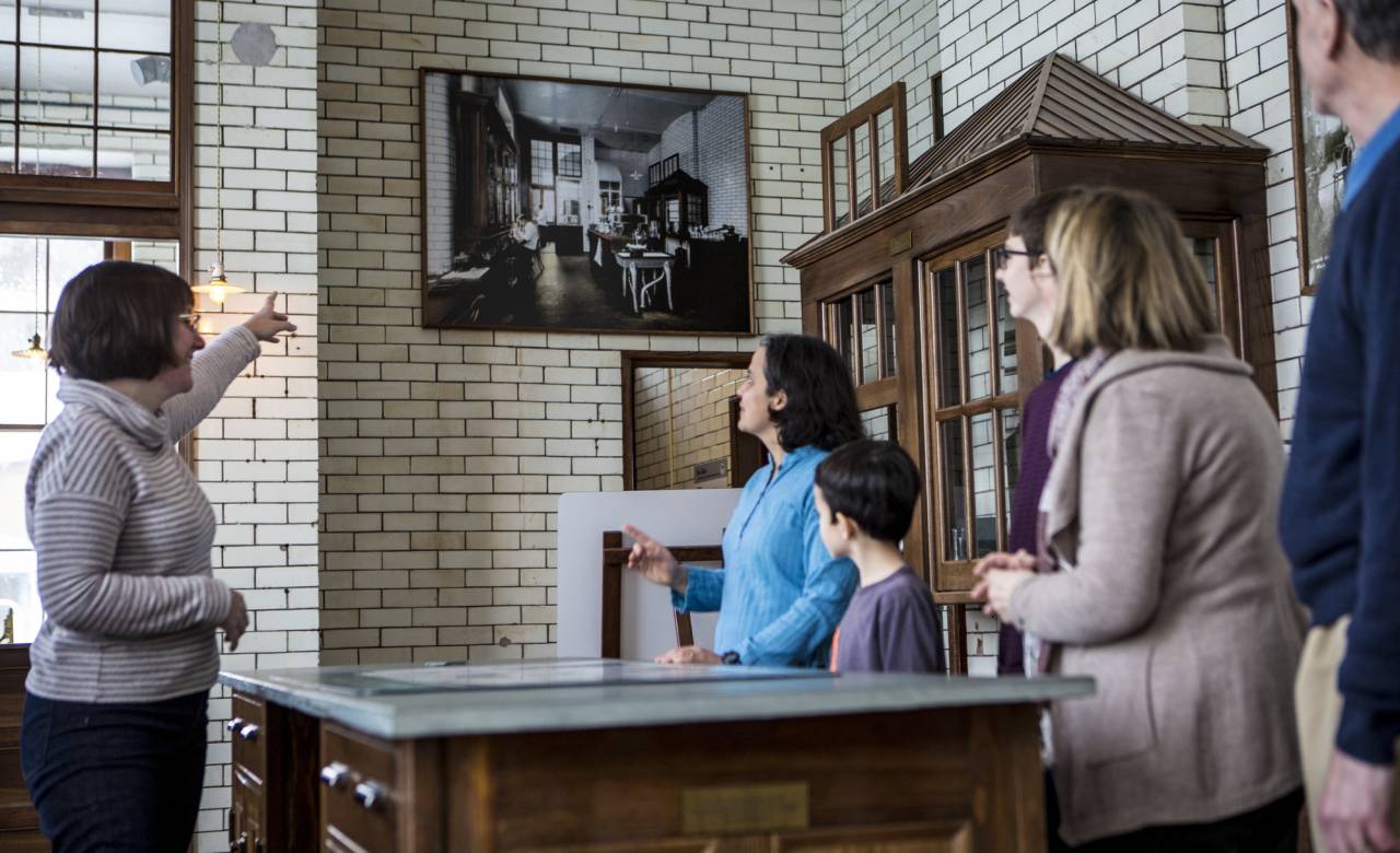 A group of visitors at the Saranac Laboratory Museum.