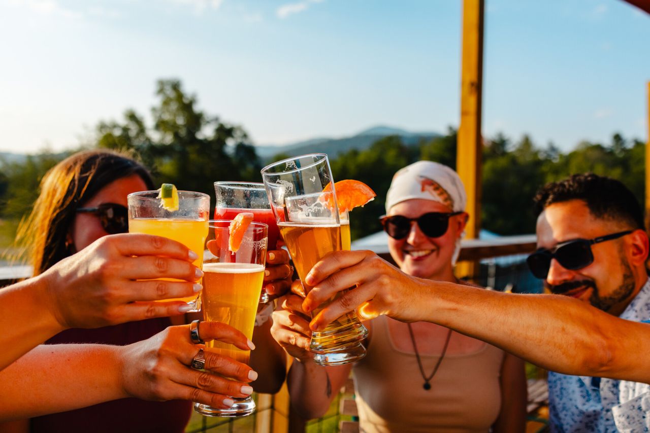 group of people cheersing