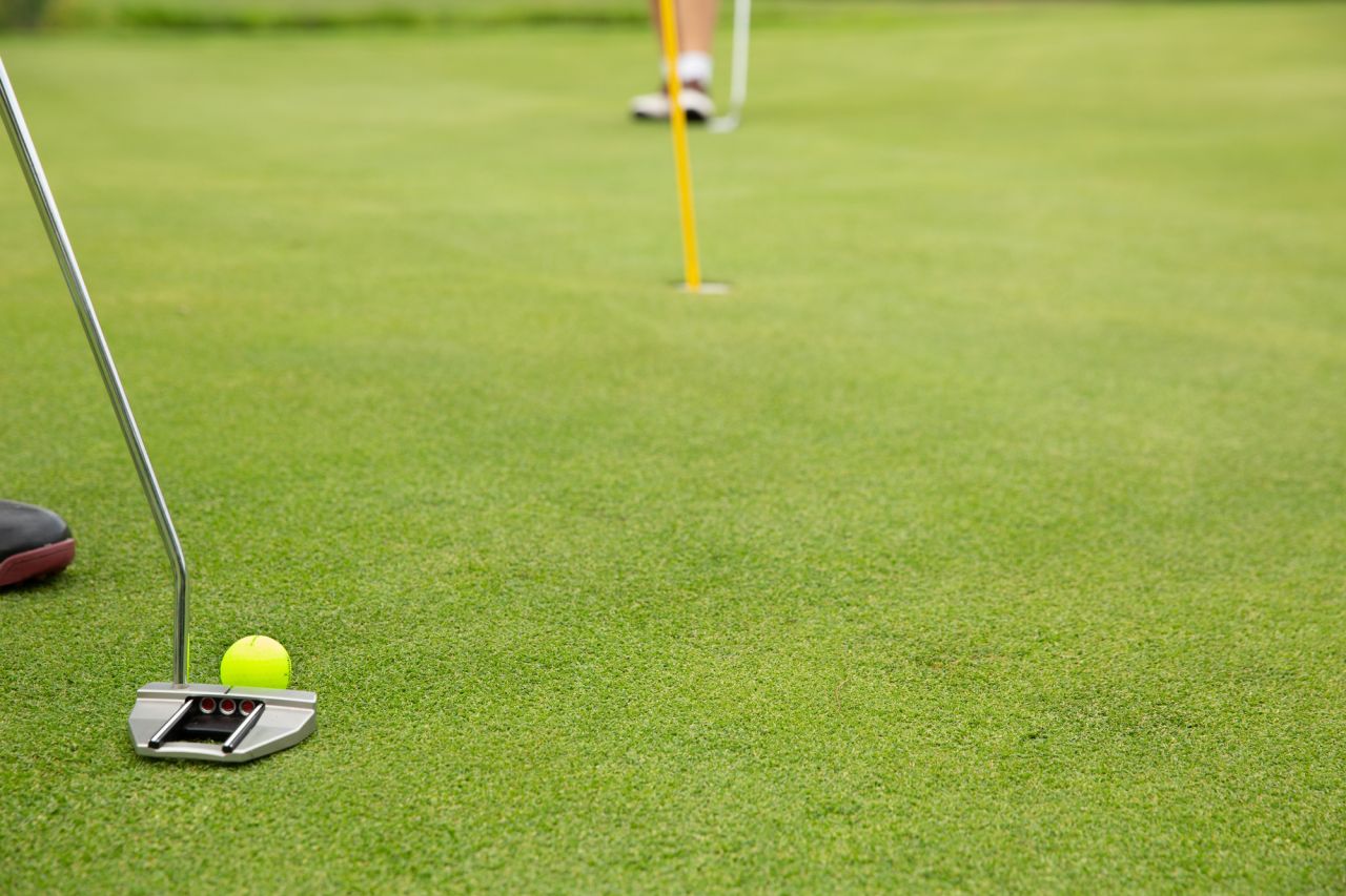 Up close shot of a putt shot - golfing