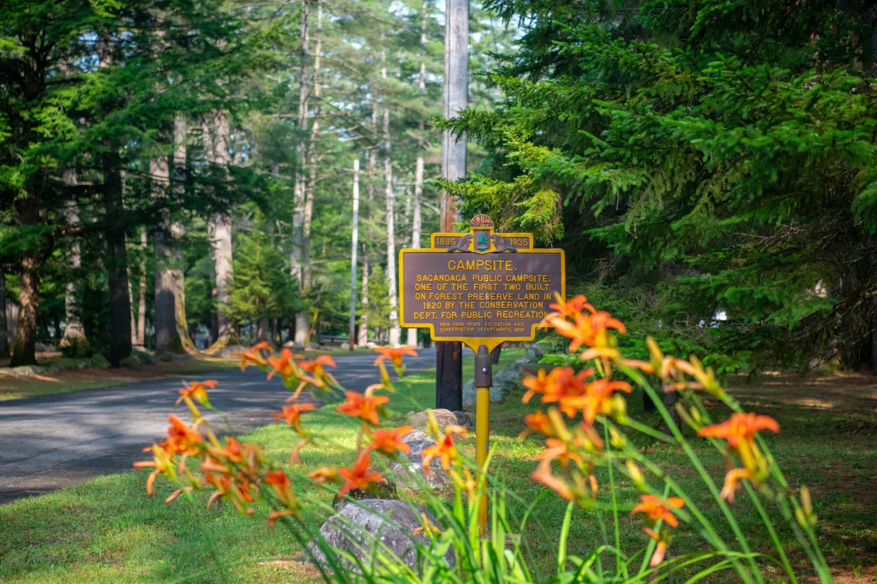 A welcome sign to Sacandaga Campground.