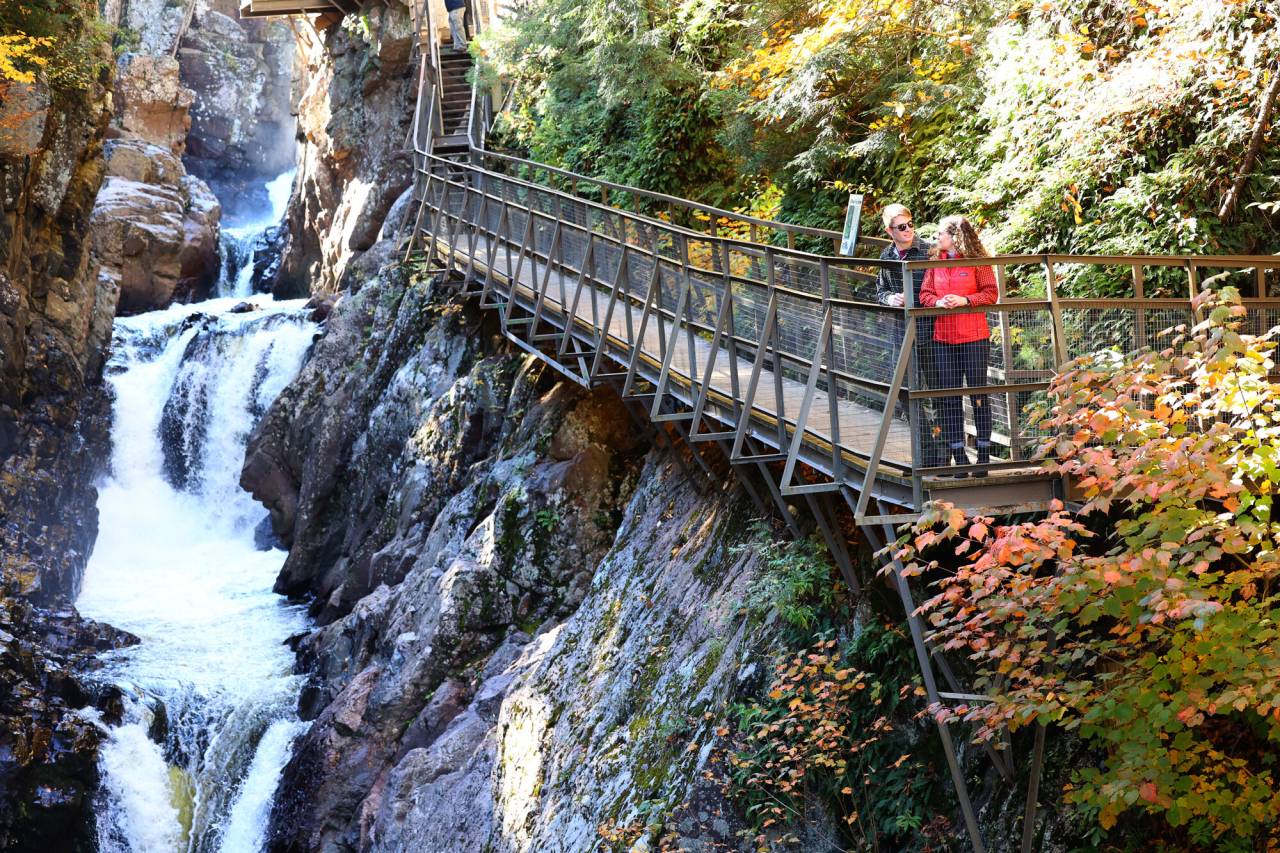 A couple at High Falls Gorge in the fall