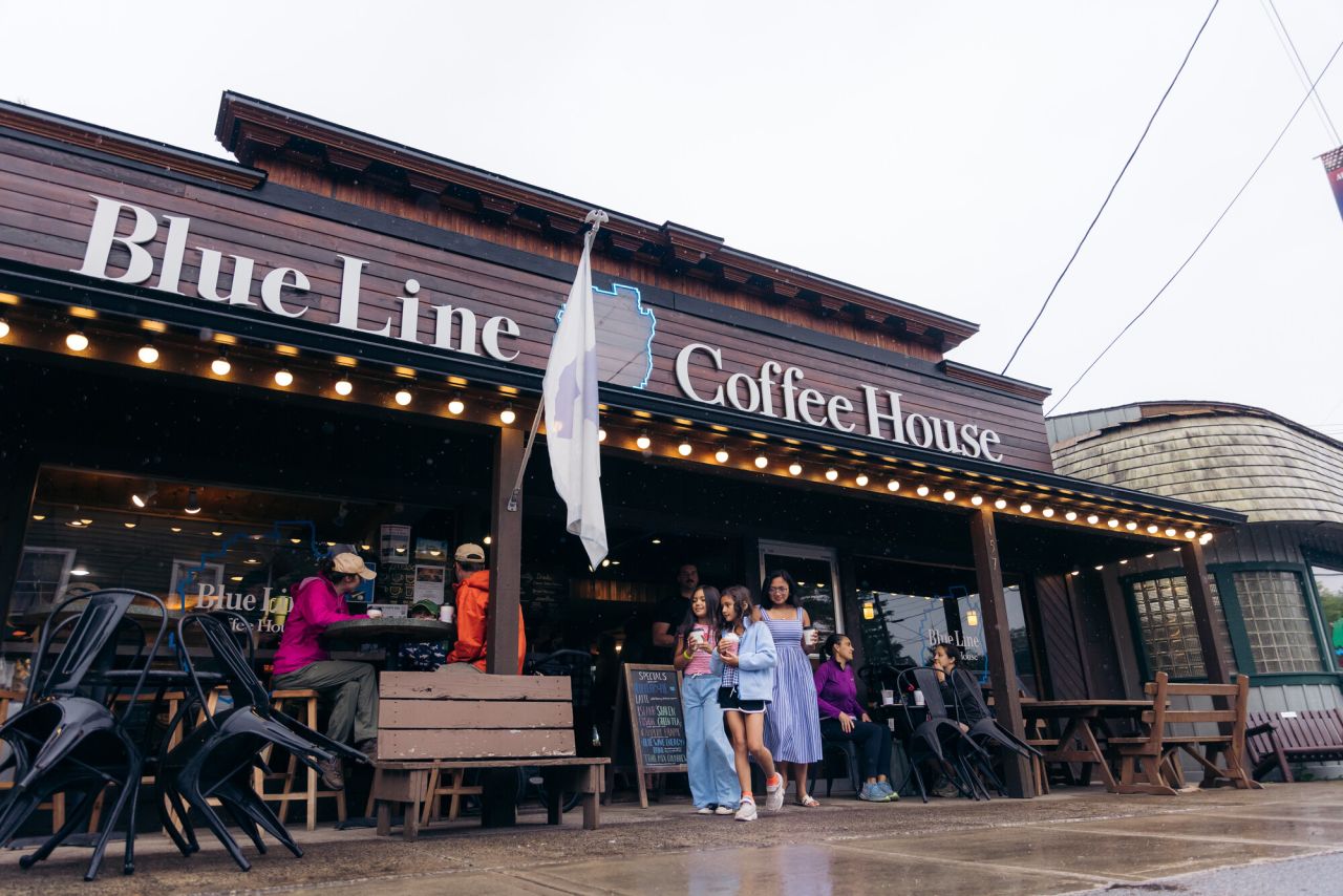 A country-style coffee house on a main street. 