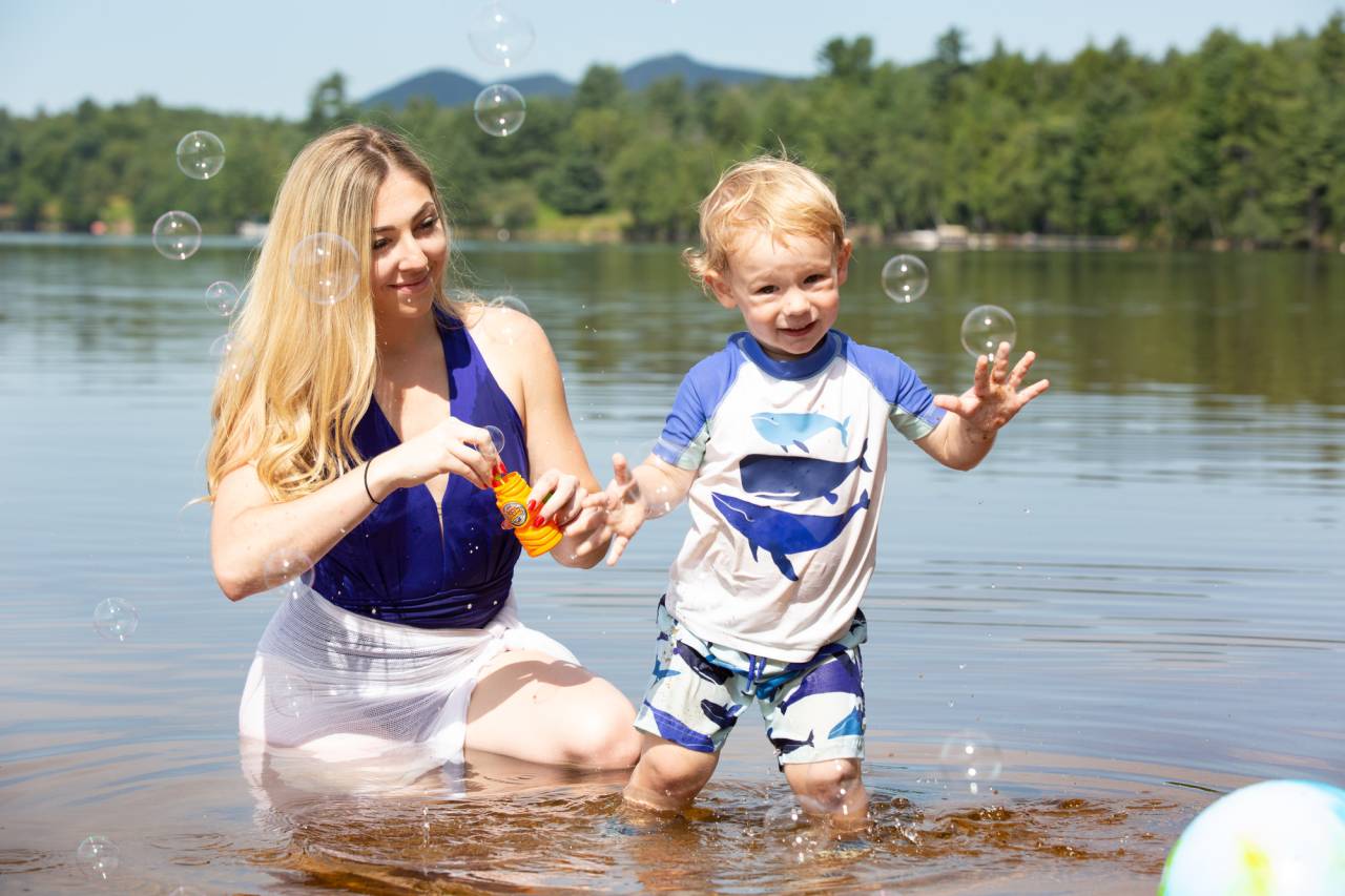 A mother and child at Lake Clear beach