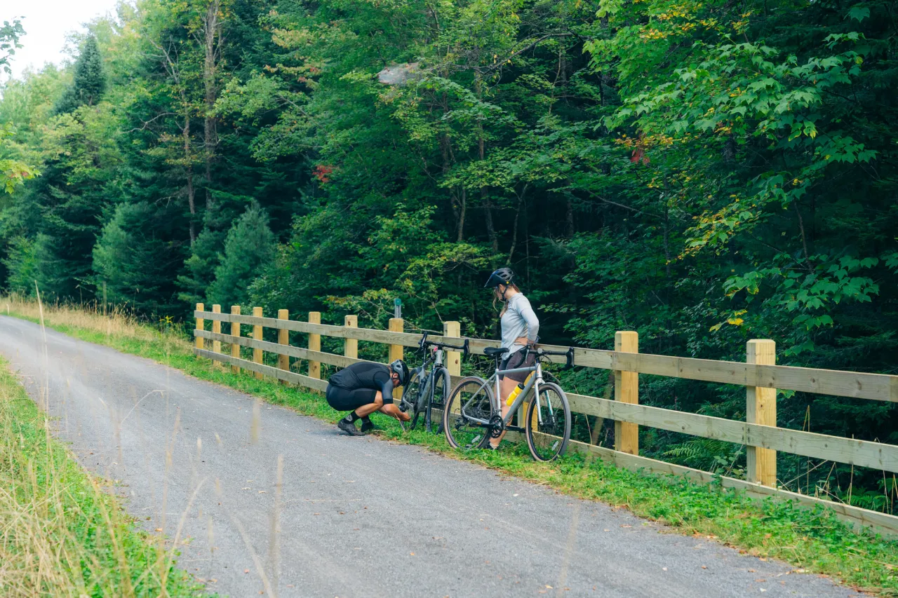 Fixing a bike on the Rail Trail.