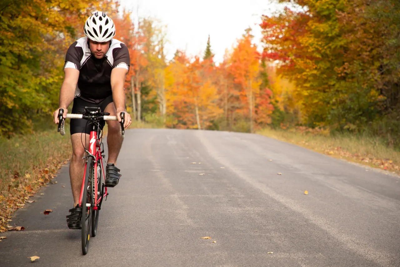 A cyclist in the fall.