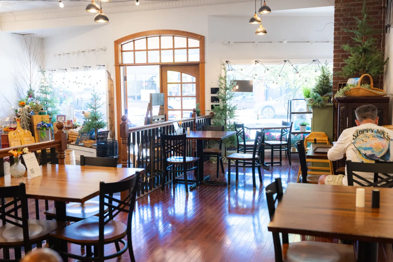 Inside Spruce and Hemlock with tables in the foreground