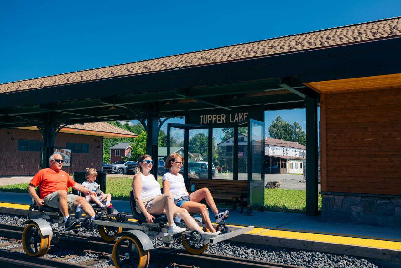 Rail Bikes leave the Tupper Lake Station
