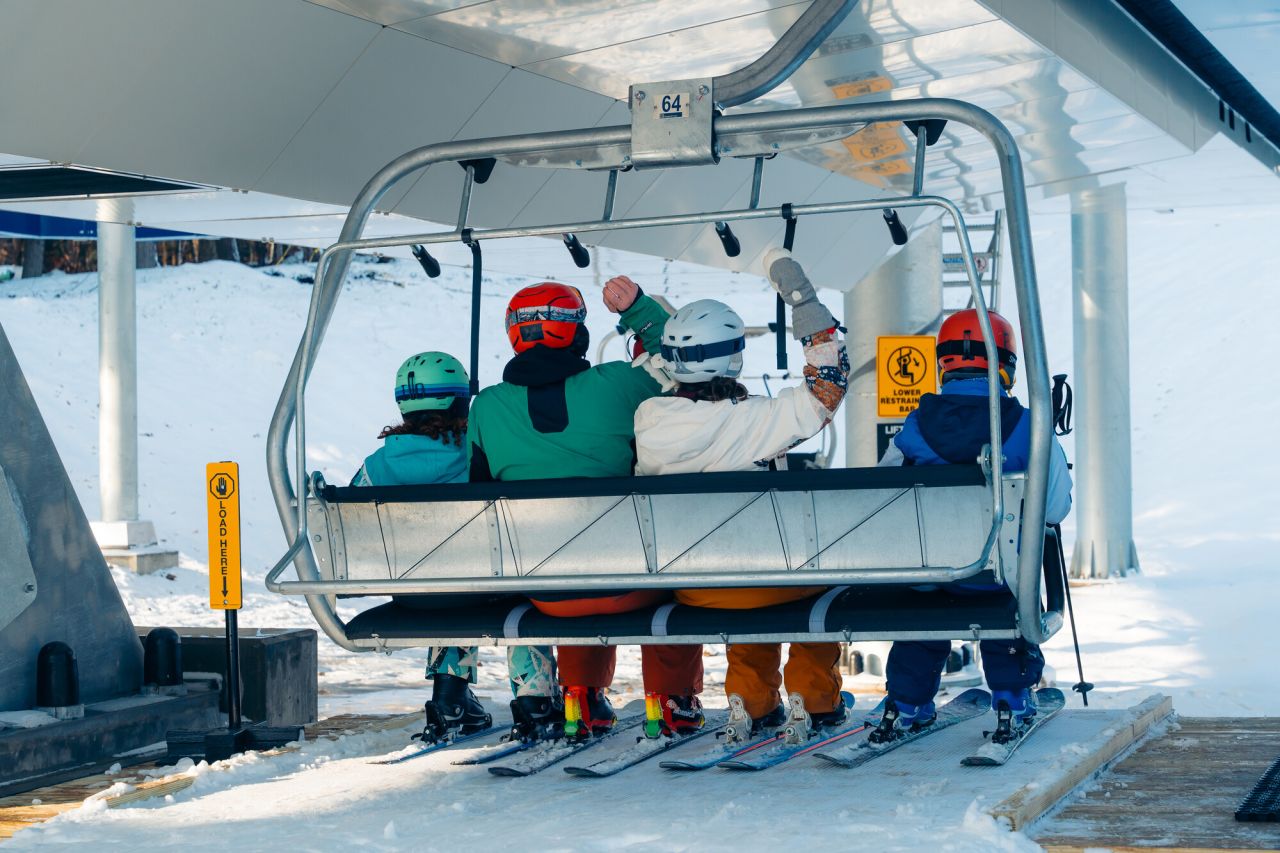 A family on the chairlift.