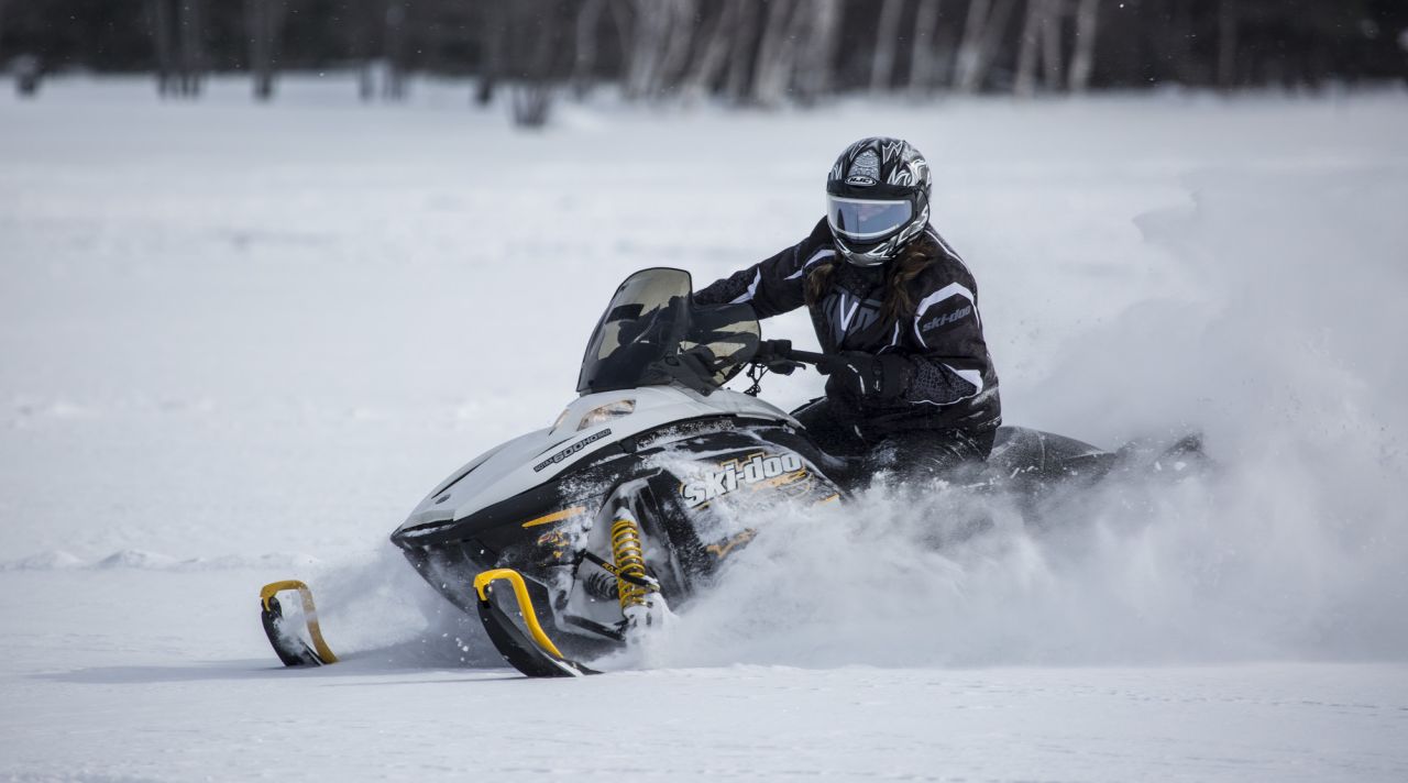 A person snowmobiling in Hamilton County.