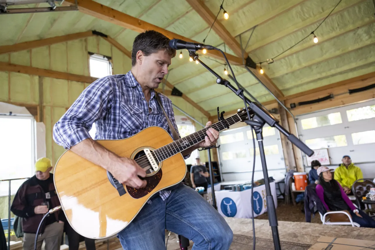 man playing guitar