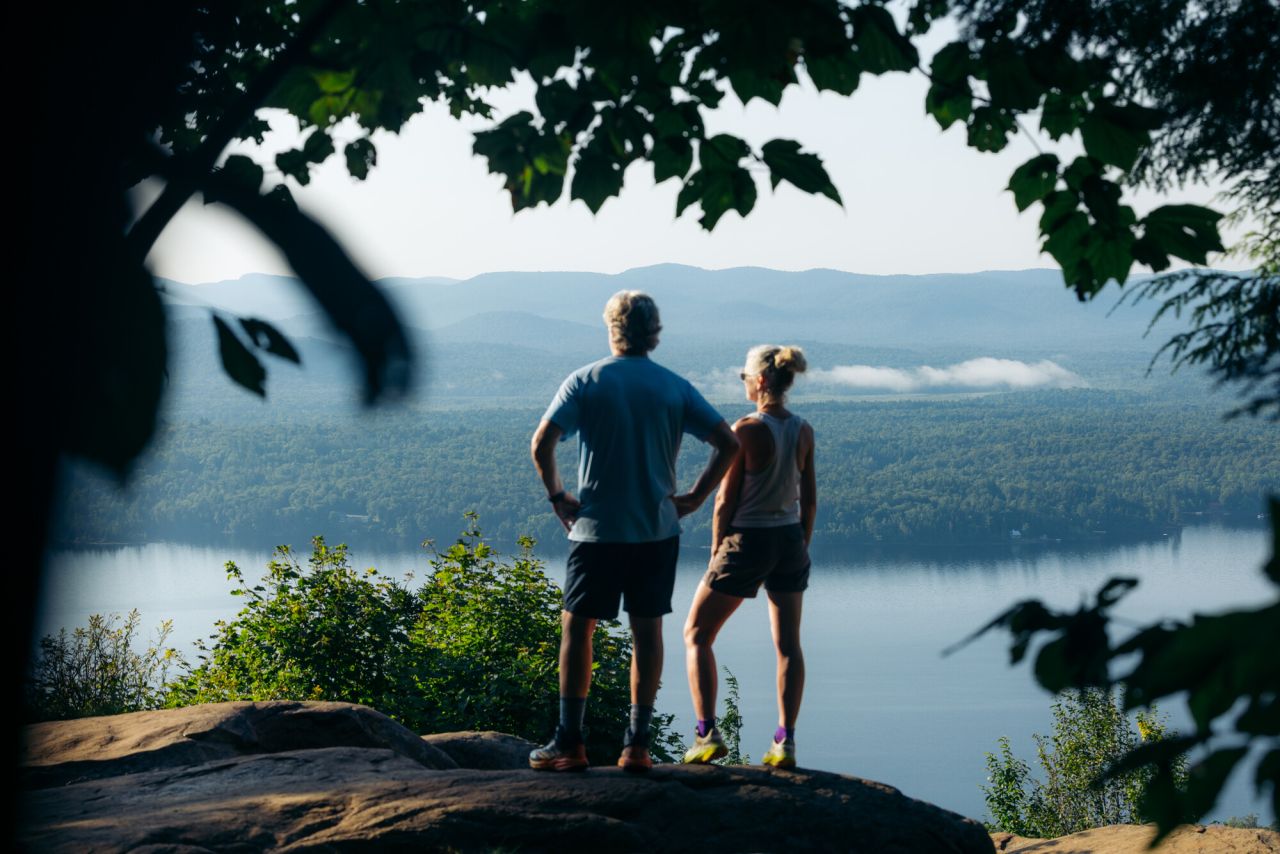 A couple hiking Panther Mountain in summer.