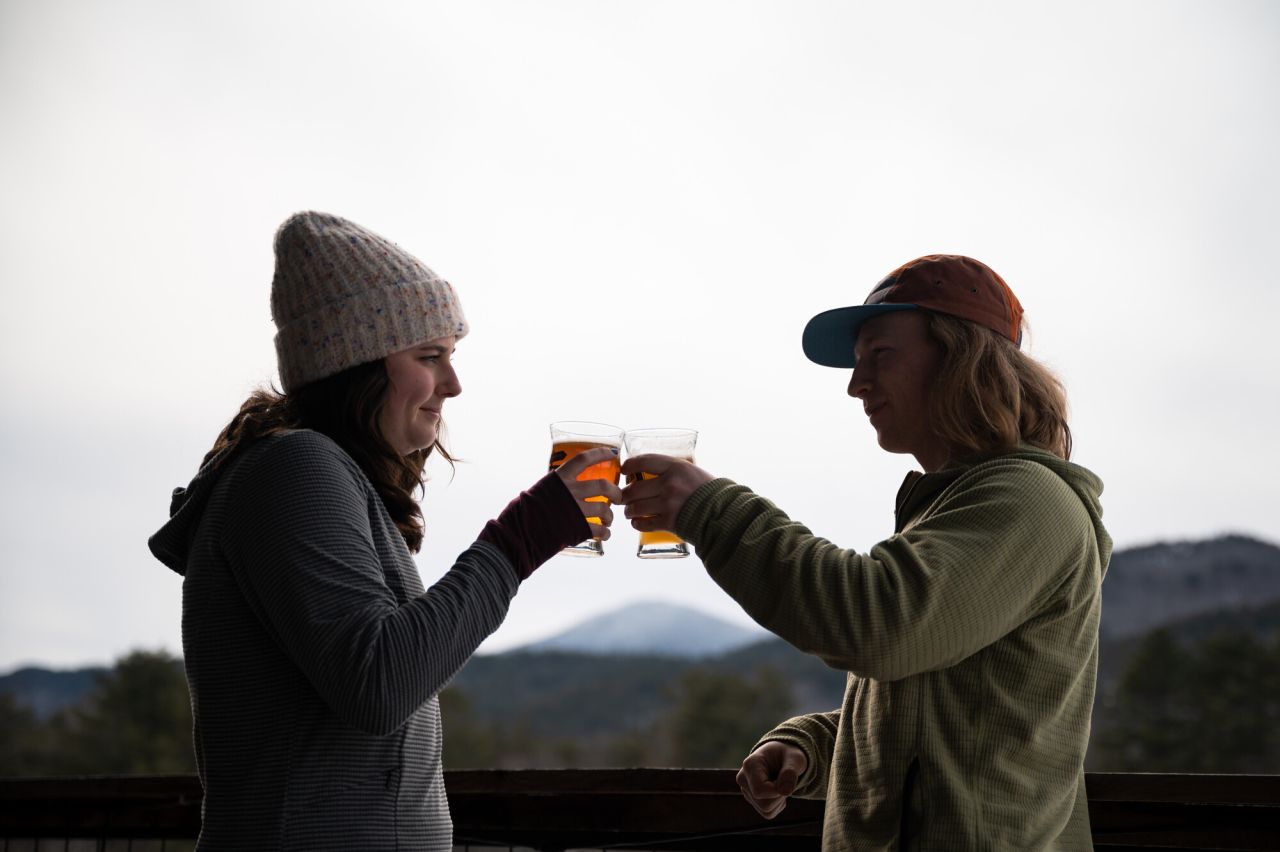 two peope cheersing