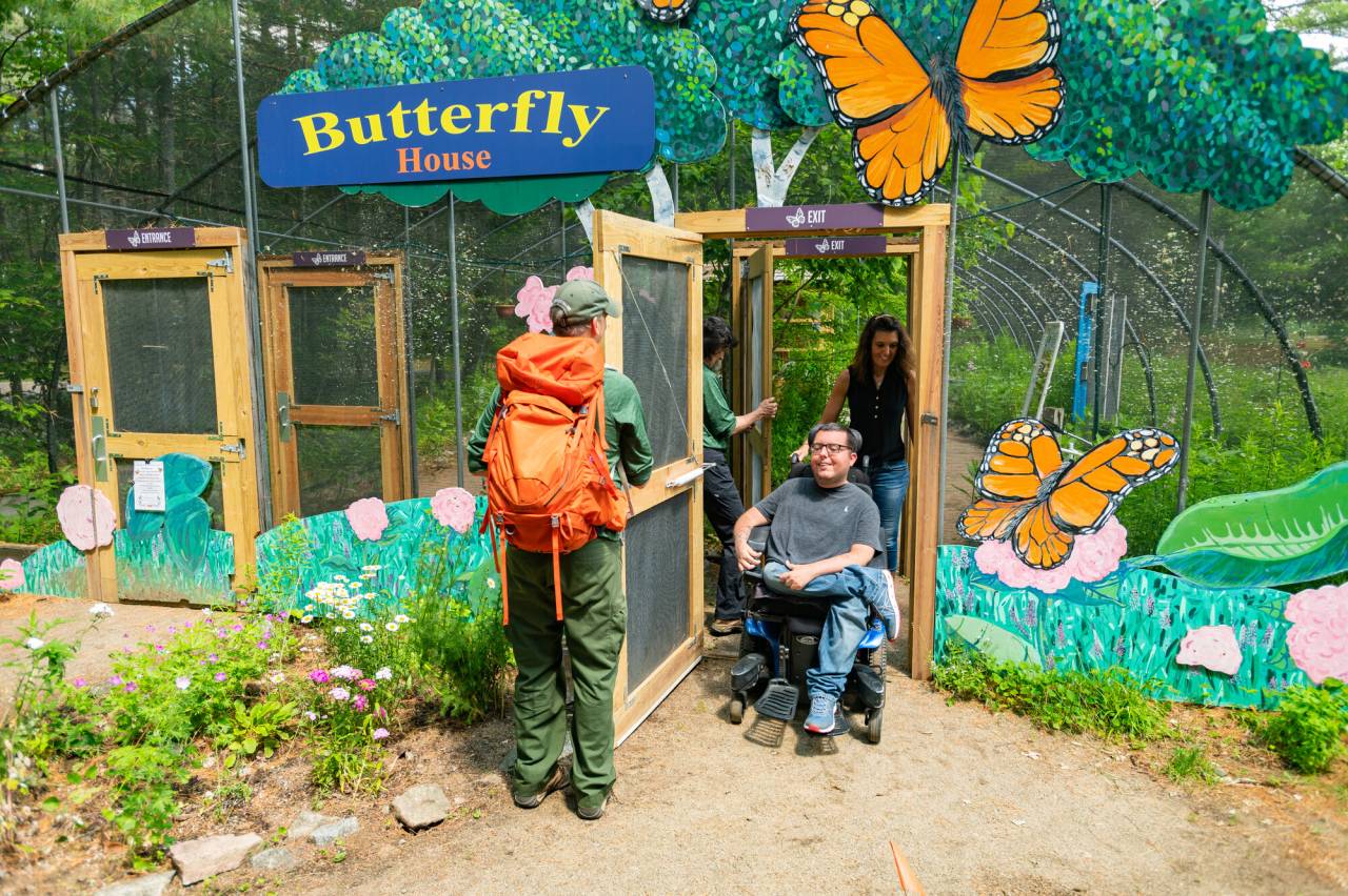 People coming in and out of the VIC Butterfly House.