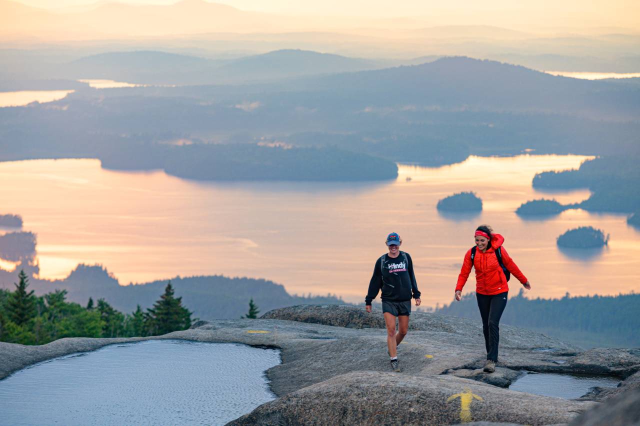 Two hikers on Ampersand Mountain.
