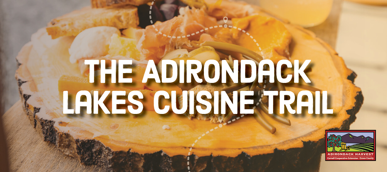 A banner that reads: Adirondack Lakes Cuisine Trail. 